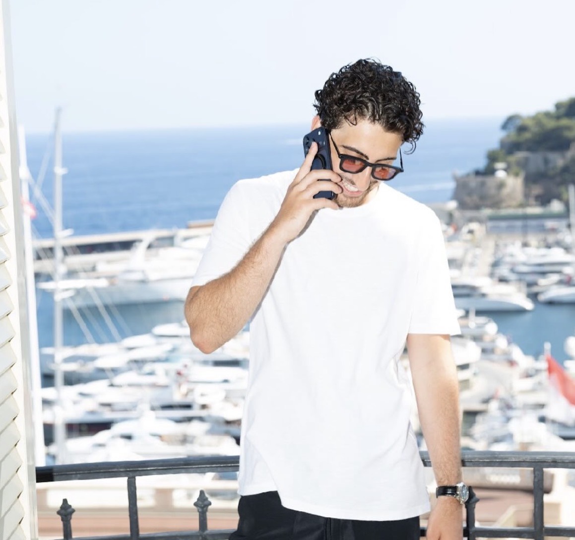 Nima CEO overlooking a Mediterranean marina